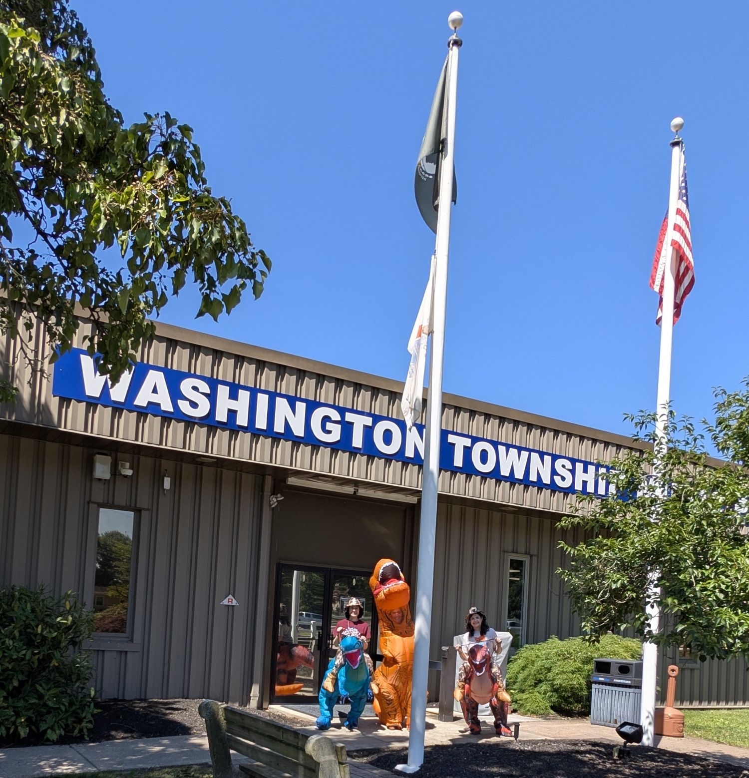 Rebeccasaurus, Stephasaurus, and Sarasaurus in front of The Washington Township Municipal Building