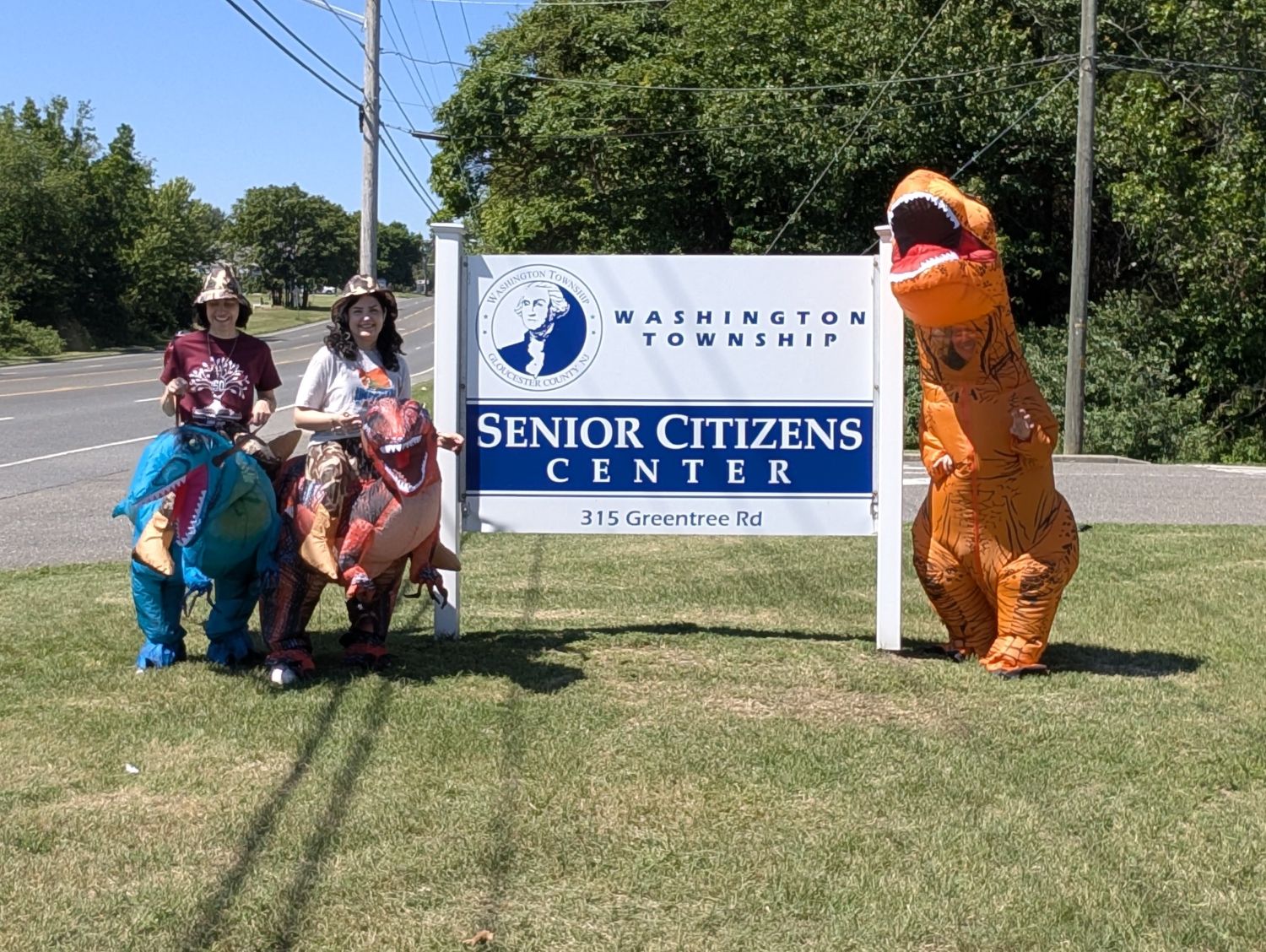 Rebeccasaurus, Stephasaurus, and Sarasaurus in front of The Washington Township Senior Citizens Center